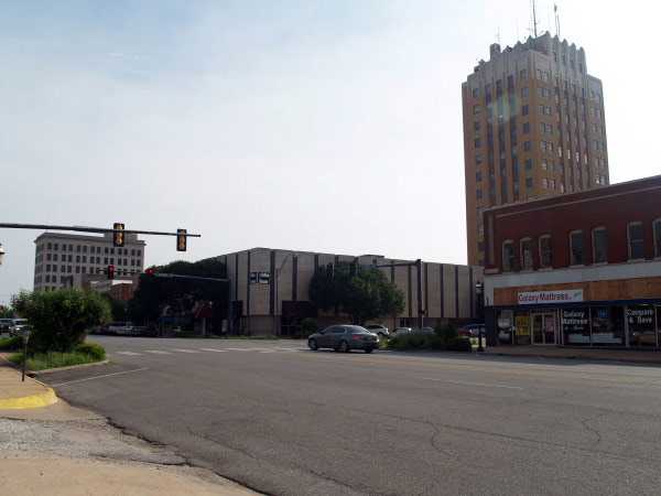 photo of downtown, buildings are leaning in at an angle
